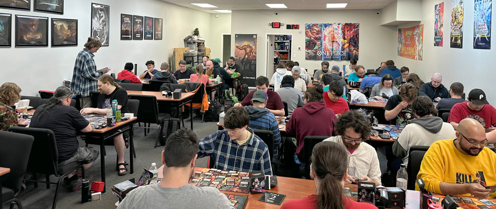 Alternate Universes Wilmington Community A room full of people enjoying a tournament at Alternate Universes Wilmington.